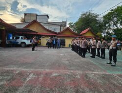 Sinergitas TNI-POLRI Melakukan Pengamanan Perayaan Malam Natal di Gereja Kecamatan Tualang