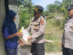 Plt, Kapolsek Medang Deras, Memberikan Bantuan Pada Masyarakat.