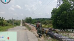 Babinsa Kandis Gelar Giat Patroli Pengamanan Line Pipa Milik PHR