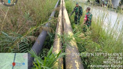 Babinsa Kandis, Patroli Pengamanan Line Pipa Area Kandis Kota dan Komsos Tentang SKK Migas Ke Warga