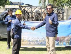 KAWASAN INDUSTRI NUSANTARA (PT KINRA) MENYERAHKAN HEWAN QURBAN SAPI KEPADA MASYARAKAT SEKITAR KAWASAN EKONOMI KHUSUS (KEK) SEI MANGKEI