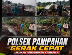 POLSEK PANIPAHAN GERAK CEPAT LAKUKAN PENDINGINAN KARHUTLA, PASTIKAN API PADAM DAN LAHAN AMAN