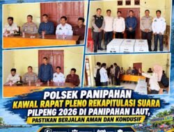POLSEK PANIPAHAN KAWAL RAPAT PLENO REKAPITULASI SUARA PILPENG 2026 DI PANIPAHAN LAUT, PASTIKAN BERJALAN AMAN DAN KONDUSIF